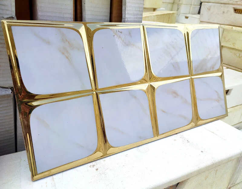 کاشی بین کابینتی طرح سنگ برلین طلایی